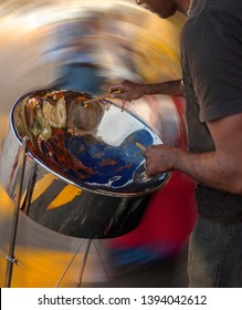 Carribean Metal Steel Drum Played By A Musician