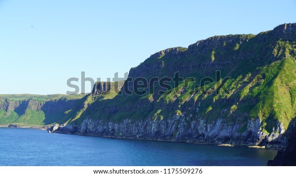 Carrick-a-Rede, Causeway Coast Route in\
a beautiful summer day, Northern Ireland, United\
Kingdom\
