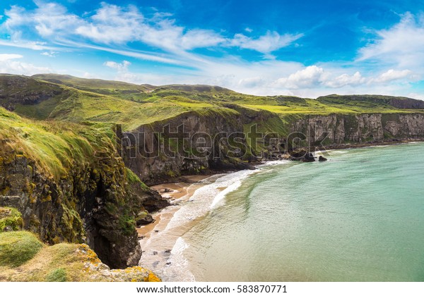 Carrick-a-Rede, Causeway Coast Route in a\
beautiful summer day, Northern Ireland, United\
Kingdom