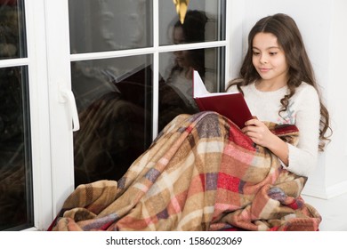 Carried Away Into World Of Fantasy. Small Girl Read Fantasy Book On Windowsill. Little Child Enjoy Reading Fantasy Story. Kids Fantasy And Imagination. Fairy Tale. Read Deep Into Night.