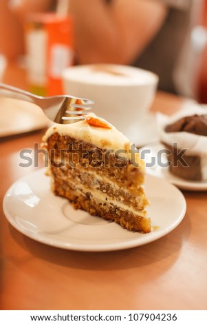 Similar – Image, Stock Photo Sweet carrot cake slice on a plate isolated