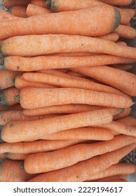 Carrot (Daucus carota L) is a biennial plant, family Aplaceae. Carrots are very beneficial for eye health. Contains vitamins A, B1, B2, B3, B6, B9, C, calcium, iron, phosphorus, potassium, magnesium . - Shutterstock ID 2229194617