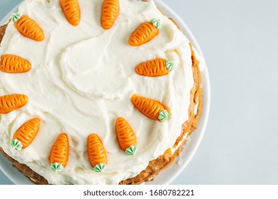 Carrot Easter Cake With Frosting And Small Carrots Deco On Top. View From Above. Easter Concept. 