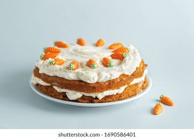 Carrot Easter Cake With Frosting And Small Carrots Deco On Top. View From Above. Easter Concept. 