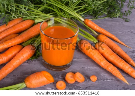 Carrot Juice a lot of vitamin A. Protects Eye. High Source of Antioxidants Especially Beta Carotene. Decreases Risk for Heart Disease. Helps Protect Against Cancer. Raw carrots and juice in a glass