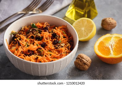 Carrot Slaw With Cranberries, Walnuts And Citrus Dressing.