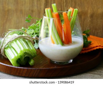 Carrots And Celery With Dip In A Glass Beakers
