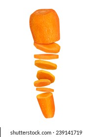 Carrots Cut Into Pieces In The Air On A White Background