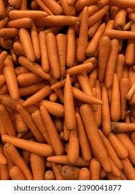 carrots Macro Photo spring food vegetable carrot. Texture background of fresh large orange carrots. Product Image Vegetable Root Carrot
