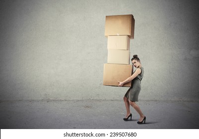 Carrying heavy boxes  - Powered by Shutterstock