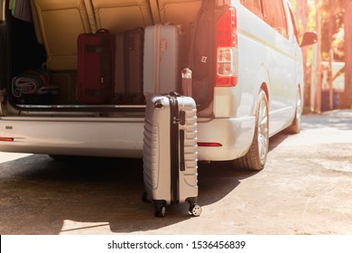 Carry-on Luggage Bag In Mini Bus Travel Concept.