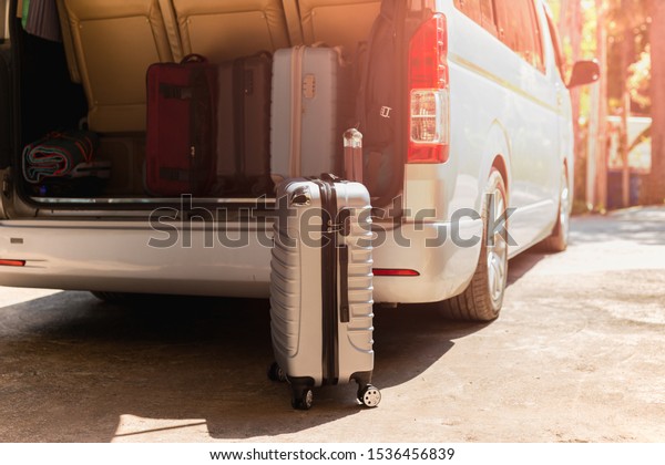 Carry-on luggage\
bag in mini bus travel\
concept.