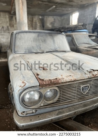 cars abandoned in a garage, urbex , lancia