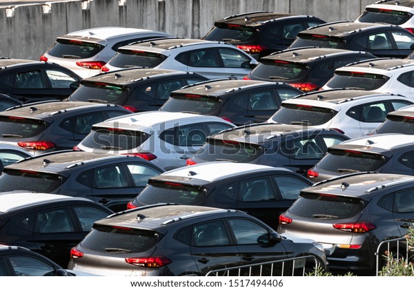 Lot of cars being transported to trade location\
closeup photo