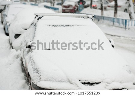 cars in Blizzard conditions
