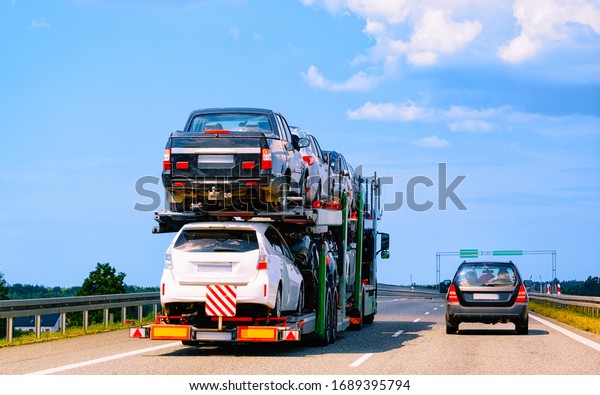 Cars\
carrier at the road in Poland. Truck\
transporter