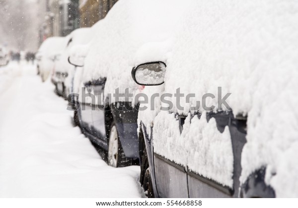 Cars Covered With Fresh White Snow After A Heavy
Blizzard In Bucharest City