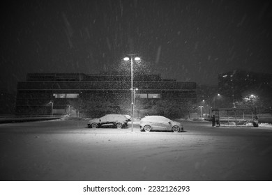 Cars covered in snow in a snow storm - Shutterstock ID 2232126293