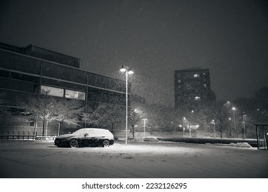 Cars covered in snow in a snow storm - Shutterstock ID 2232126295