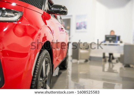 Cars and the dealer in auto salon