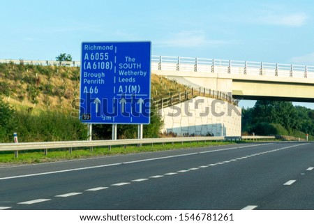 Similar – Motorway signpost to Berlin