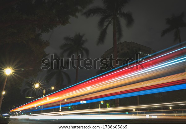 Cars driving in the\
night city of Taiwan