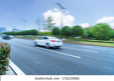 Cars Driving On Inner City Road Of Suzhou, China, Asia
