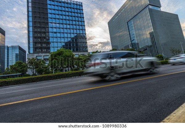 cars\
driving on inner city road of Suzhou, china,\
asia\
