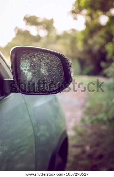 Cars driving\
in the rainy season must be careful to drive and the route to go to\
safety both the driver and the\
car.