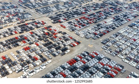 Cars Export Terminal In Export And Import Business And Logistics. Shipping Cargo To Harbor. Water Transport International. Aerial View And Top View.