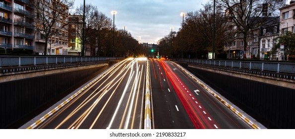 Cars Fast Trafic Lights On A Road At Night In A Tunnel