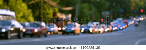 cars go on road.\
abstract backdrop of cars are in traffic. transportation, Urban\
traffic concept, waiting for ride. Rush hour with defocused auto.\
copy space.