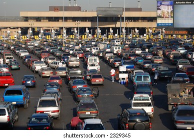 Cars lined up to pass into America from Tijuana Mexico