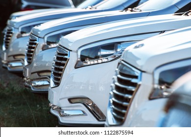 cars located row at shallow depth of field - Shutterstock ID 1122875594