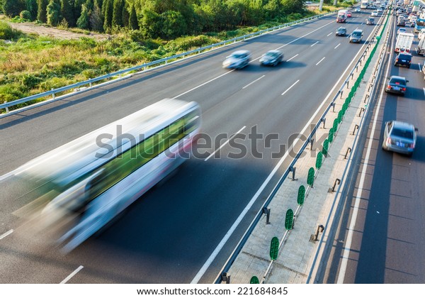 Cars in motion\
blur on highway,Beijing\
China