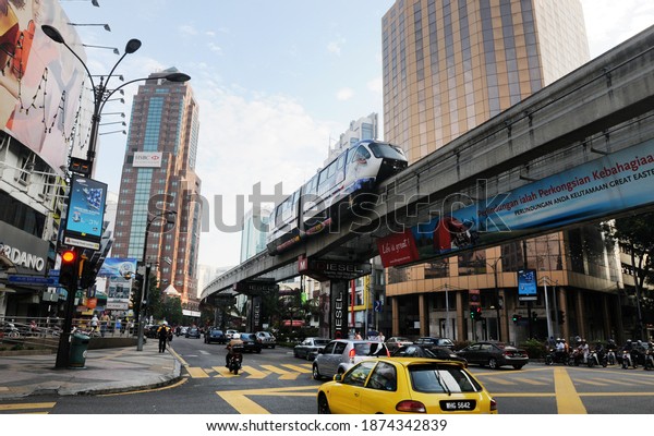 Cars move on the KL Monorail train at a popular\
tourist spot in Malaysia, namely Bukit Bintang Kuala Lumpur\
Malaysia on April 21, 2010