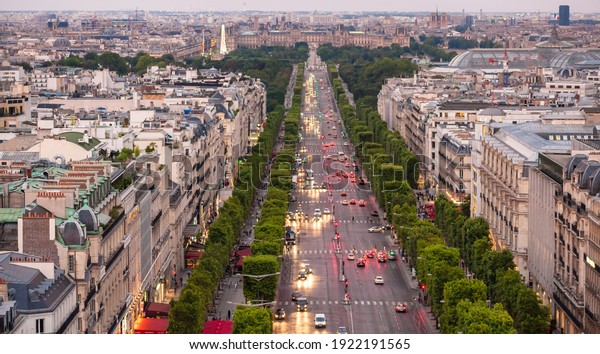 Cars on the Champs Elysees\
in Paris