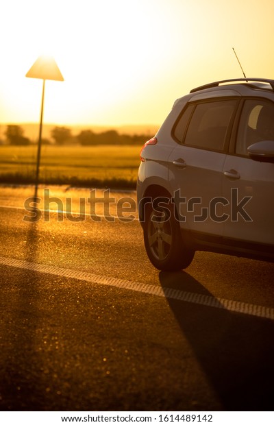 Cars on the road at sunset. Car. Travel. Road\
trip. Car rental.