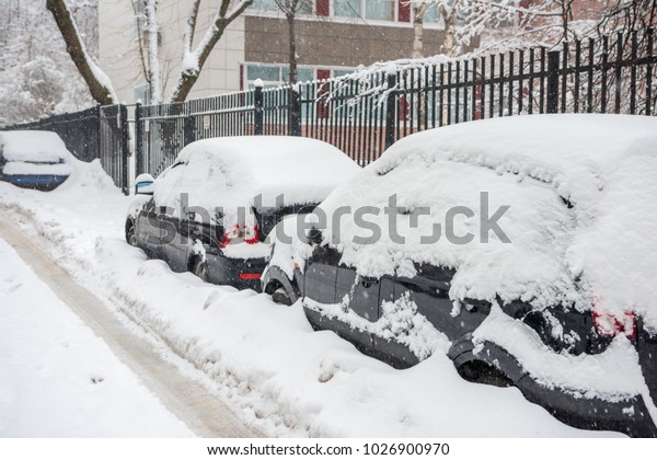 Cars on the street in the
snow