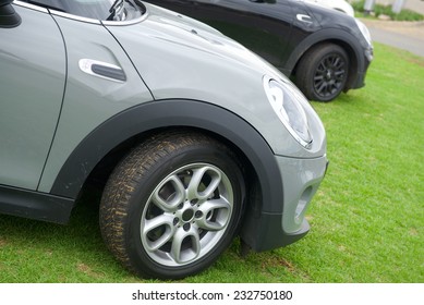 Cars Parked On Grass