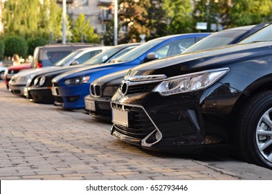 Cars Parked On Parking In Row