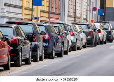 Cars Parked On The Roadside