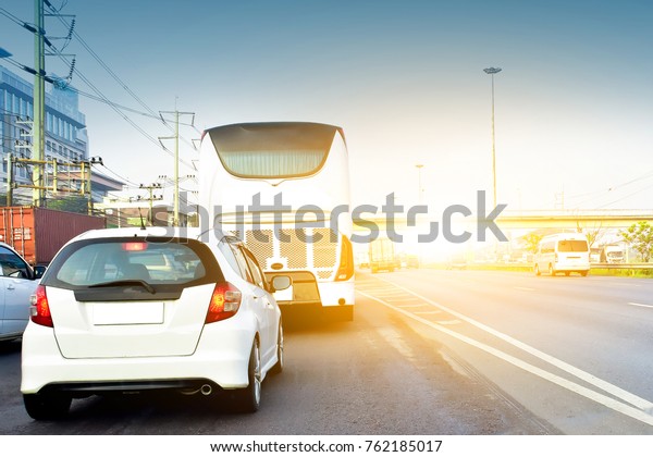 Cars parked on the street.Car on street,Car on\
road,Car park on road