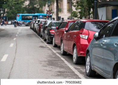 Cars Parked On The Urban Street Side