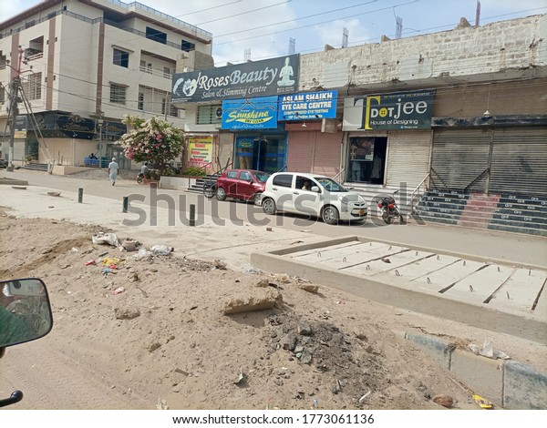 Cars parked outside a beauty parlor . Karachi\
Pakistan - Jul 2020