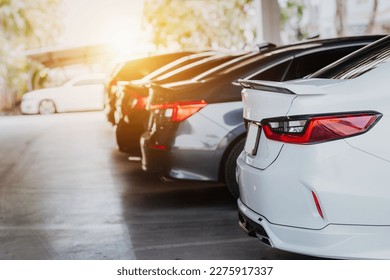 Cars parked in a row in the parking lot - Shutterstock ID 2275917337
