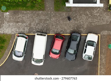 cars in the parking area of a top view of the house. Belarus, Minsk, May 13, 2015