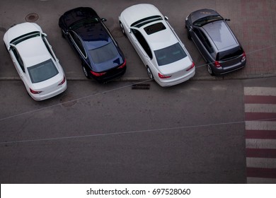 Cars In The Parking Lot. View From Above. Parked Cars. Parking