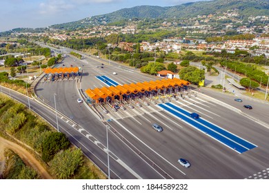 Cars Passing Through The Automatic Point Of Payment On A Toll Road. Spain