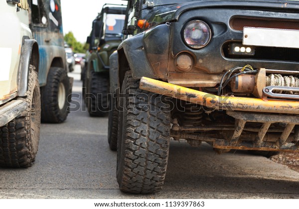Cars prepared for off-road before\
going on a trip, four-wheel drive, freedom of\
movement